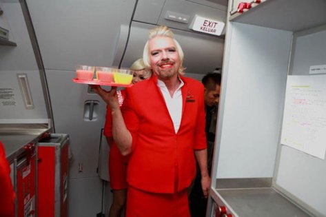 richard-branson-loses-bet-dresses-as-a-female-stewardess-12